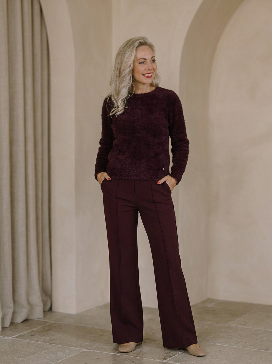 Opgevouwen jeans met meetlint